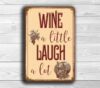 Wine a little laugh a lot sign