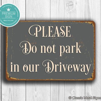 Please do not park in Our Driveway Sign