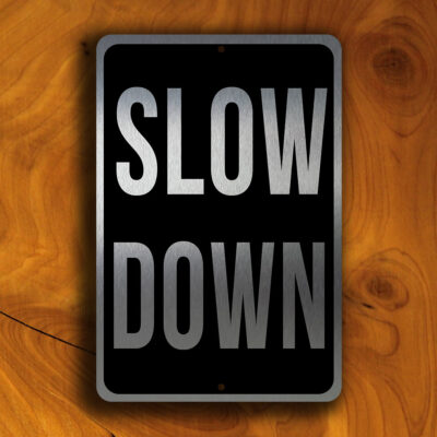 SLOW DOWN SIGN