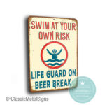 Swim at your own Risk signs