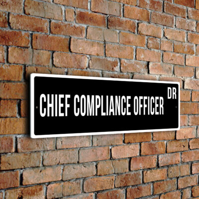 Chief Compliance Officer street sign