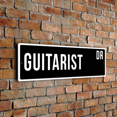 Guitarist street sign
