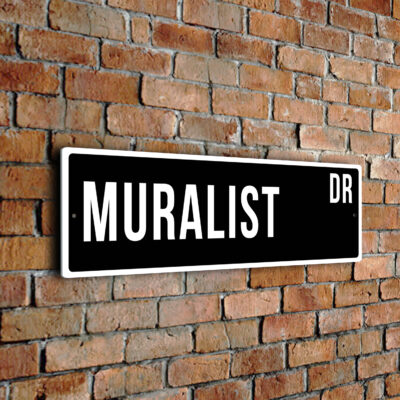 Muralist street sign