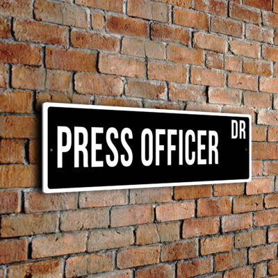 Press Officer street sign