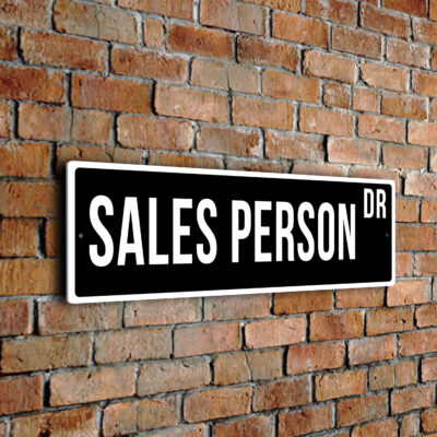 Sales Person street sign